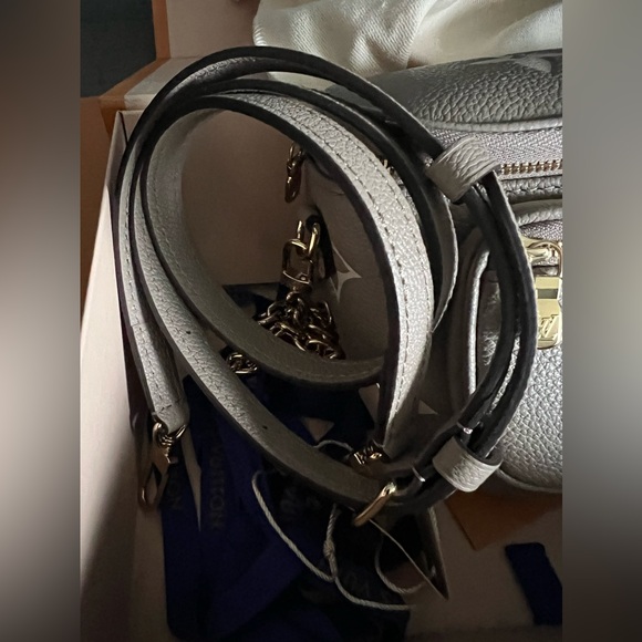 Brand new Louis Vuitton mini bumbag in bicolor monogram empreinte leather. - Picture 9 of 16